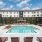Resort-style swimming pool with lounge seating