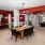 A spacious clubroom with red walls