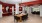 A spacious clubroom with red walls