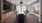 a spacious room with a long table and a big window